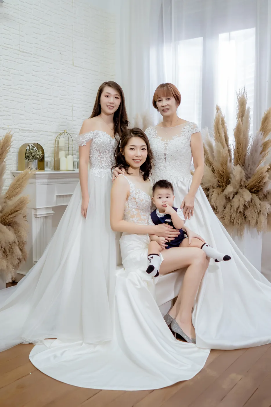 Family photoshoot wardrobe Singapore - gowns and suits from the Cang-Ai studio