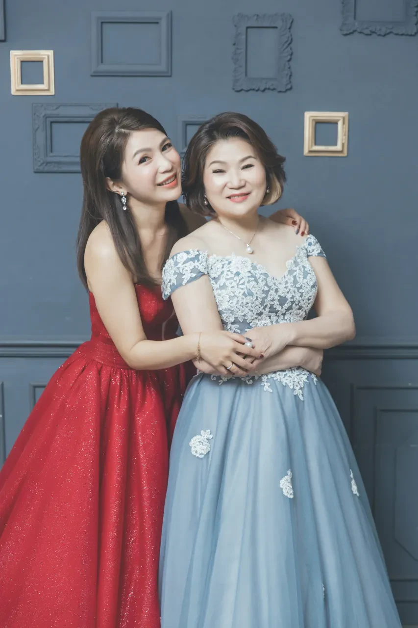 Family photoshoot wardrobe Singapore - gowns and suits from the Cang-Ai studio