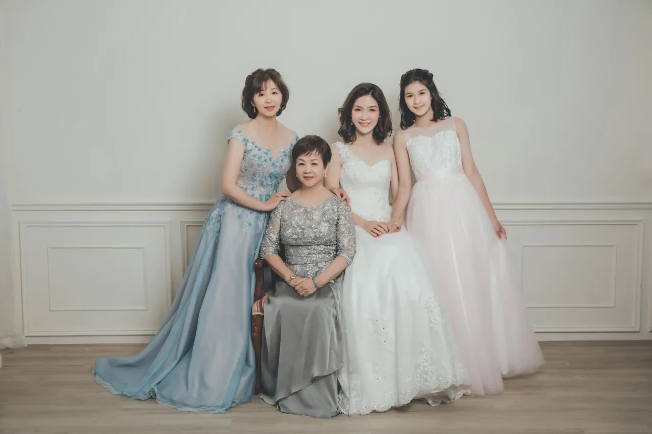 Family photoshoot wardrobe Singapore - gowns and suits from the Cang-Ai studio