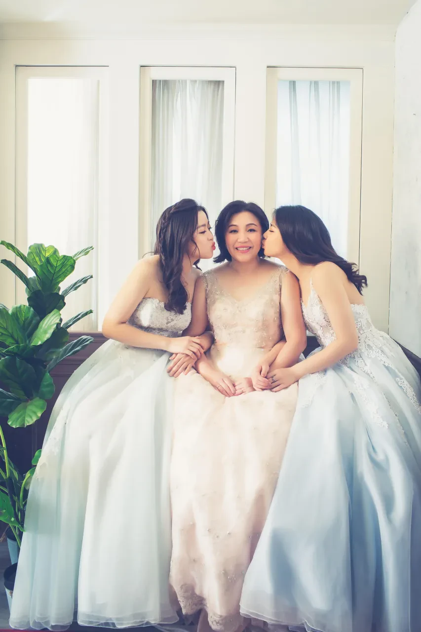 Family photoshoot wardrobe Singapore - gowns and suits from the Cang-Ai studio