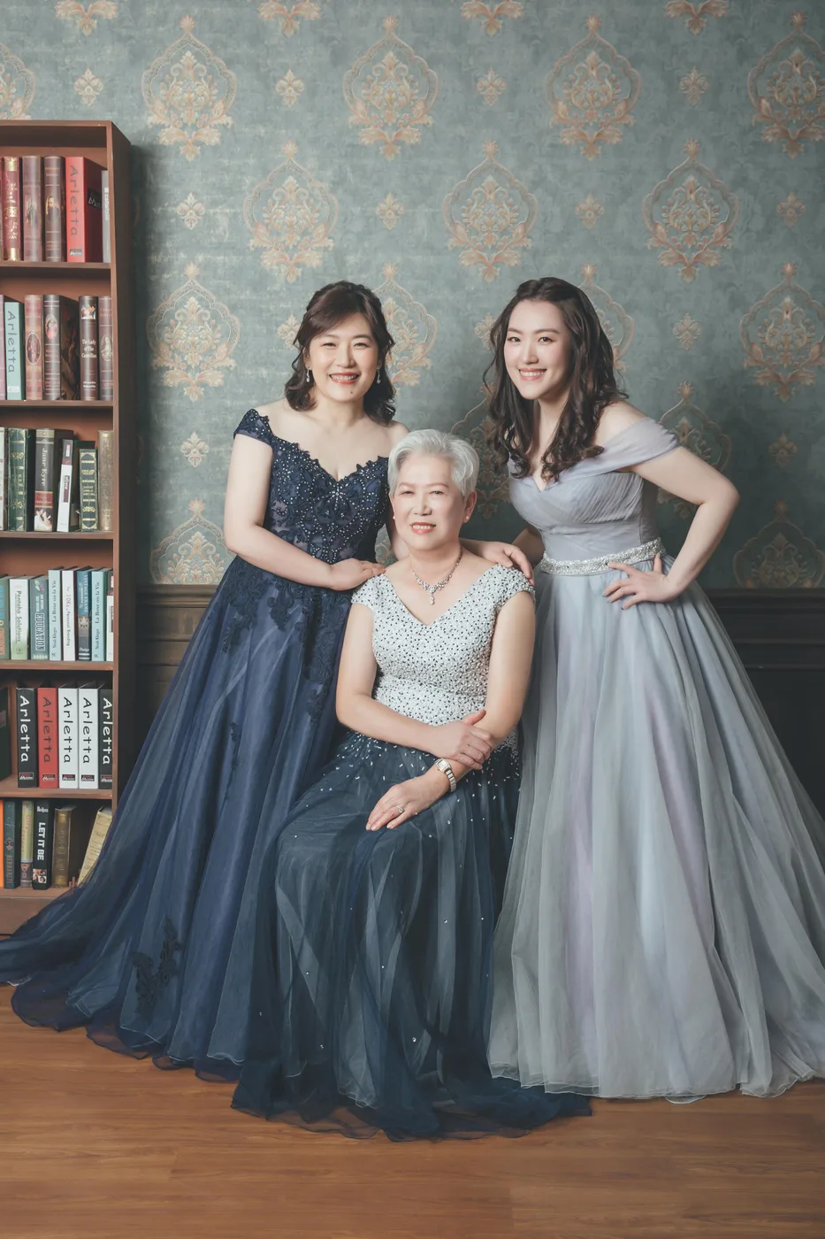 Family photoshoot wardrobe Singapore - gowns and suits from the Cang-Ai studio
