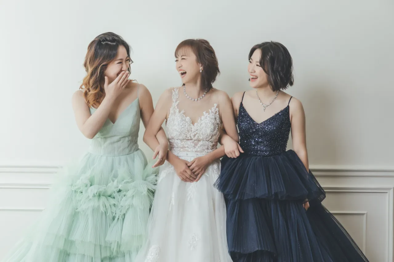 Family photoshoot wardrobe Singapore - gowns and suits from the Cang-Ai studio
